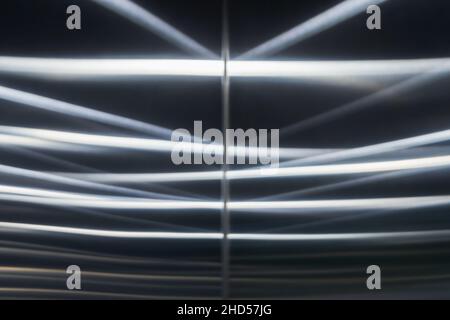 Brushed steel wall with blurred reflections pattern, abstract background photo of an elevator doors Stock Photo