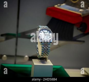 A  Rolex brand watch on display in a jewelry store window in New York on Tuesday, December 28, 2021. Owners of the luxury watches are reported to be commissioning copies to wear in public in the event of a theft. (© Richard B. Levine) Stock Photo