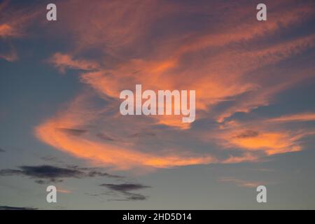 Scenic view of clouds floating in the sky during a bright sunset Stock Photo