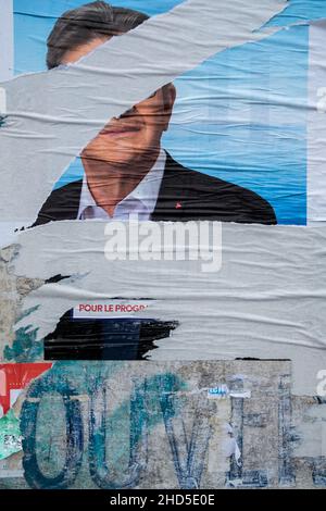 A poster of the extreme left-wing candidate Jean Luc Melanchon is seen torn in the face. The election of the President of the French Republic will take place on Sunday, April 10, 2022 for the first round and on Sunday, April 24, 2022 for the second round. In Guadeloupe, Martinique, French Guiana, St. Pierre and Miquelon, St. Barthélemy, St. Martin and French Polynesia, voters will vote on Saturday, April 9 and Saturday, April 23 due to the time difference. Stock Photo