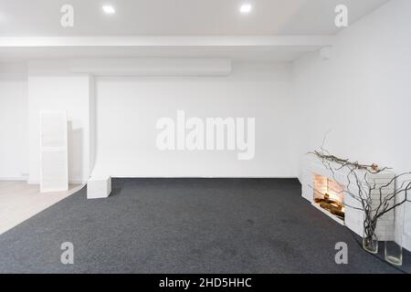 Modern white loft room with big windows and city view Stock Photo