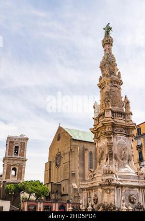 Guglia Dell Immacolata baroque obelisk at the Piazza Del Gesu in historic center of Naples in Italy Stock Photo