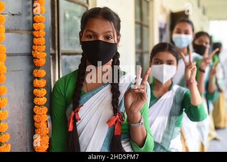 Guwahati, Assam, India. 3rd Jan, 2022. Students in queue as they are waiting to get a vaccine against COVI-19, during a vaccination drive for people in the 15-18 age group at a school in Guwahati, Assam. India has detected more than 1,700 cases of Omicron variant of novel coronavirus infection. (Credit Image: © David Talukdar/ZUMA Press Wire) Stock Photo