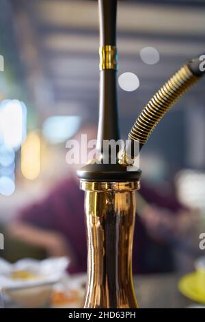 Hookah on table in lounge bar. Stock Photo