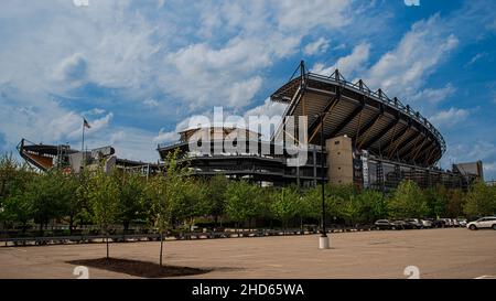 Pittsburgh, PA—April 30, 2019; low angle view of Heinz Field, home of NFL Steelers football team on a spring day with parking lot in foreground. Stock Photo