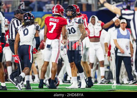 Alabama Crimson Tide wide receiver Ja'Corey Brooks (7) and Cincinnati Bearcats linebacker Deshawn Pace (20) get into a heated exchange in the second h Stock Photo