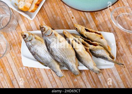 Dried roaches served on plate Stock Photo