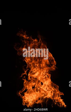 Fire blaze flames on black background. Fire burn flame isolated, abstract texture. Flaming explosion effect with burning fire. Stock Photo