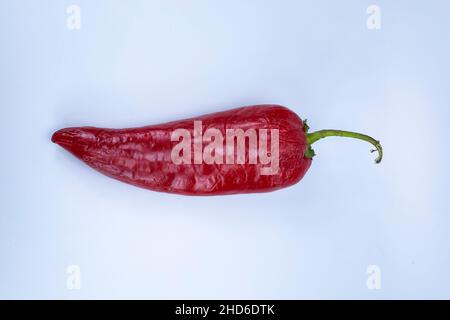 Dried Aleppo pepper, whole pods crossed, top view Stock Photo