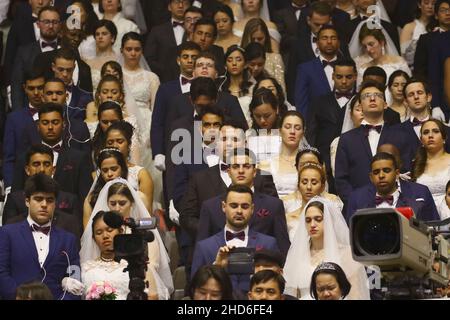 Feb 07, 2020-Gapyeong, South Korea-Thousands of couples take part in a mass wedding of the Family Federation for World Peace and Unification, commonly known as the Unification Church, at Cheongshim Peace World Center in Gapyeong-gun, South Korea. Stock Photo