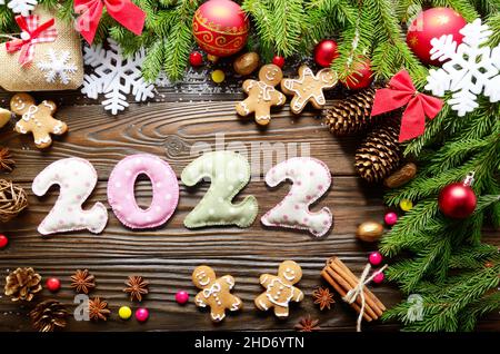 Colorful Stitched Digits 2022 Of Polkadot Fabric With Christmas Decorations Flat Lay On Wooden Background Stock Photo - Alamy