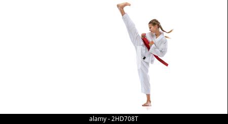 karate concept. teen girl practicing karate. girl karate fighter on sky ...