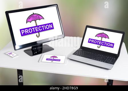Protection concept shown on different information technology devices Stock Photo
