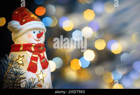 Christmas decoration banner, background, card- snowman figurine candle light holder. Stock Photo