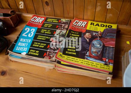 Two piles of Car Mechanics magazines on display at auction, UK Stock Photo