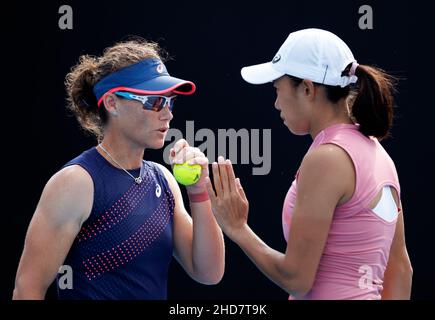 SAMANTHA STOSUR (AUS) and SHUAI ZHANG (CHN) in action at the 2022 Melbourne Summer Set on Tuesday January 2022,  Melbourne Park Stock Photo