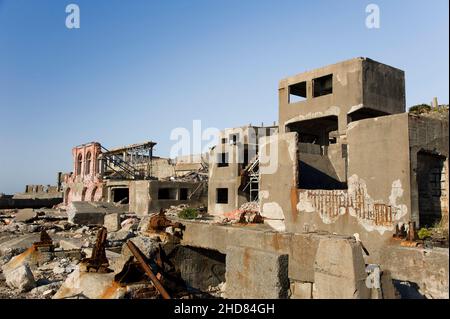 Derelict buildings on the abandoned island of Hashima, also known as Gunkanjima and Battleship Island, near Nagasaki, Japan. Stock Photo