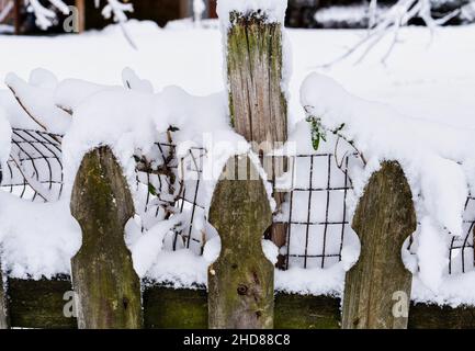 neighborhood street blanketed in snow Stock Photo