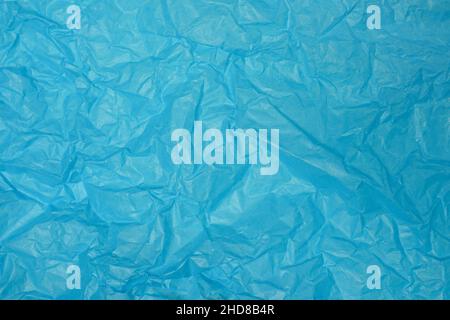 Blue package with wrinkles texture background Stock Photo