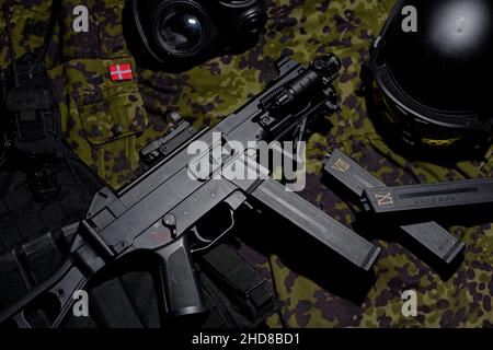 Assortment of tactical equipment and sub machinegun. Stock Photo