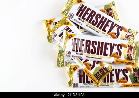 May 4, 2021. New York, US. Hersheys chocolate bar with whole almonds on isolated white background. Stock Photo