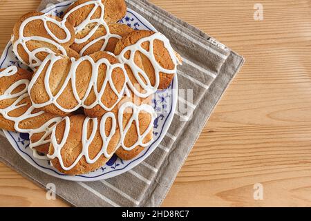 Composition with biscuits on a wooden table with sugar and teaspoon Stock Photo