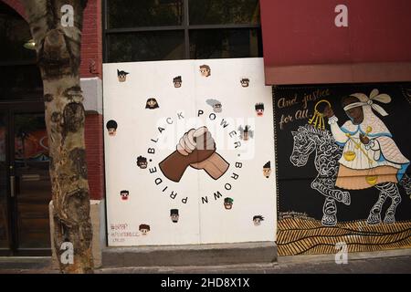 Paintings over boarded up building in downtown Albuquerque, New Mexico, Summer 2020 Stock Photo