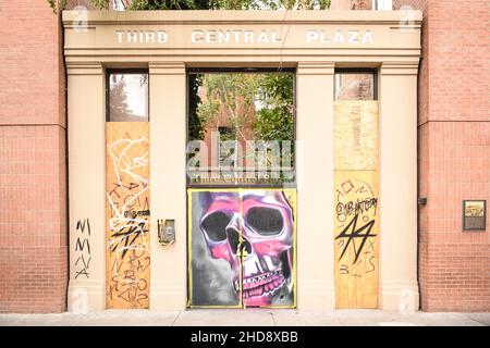 Paintings over boarded up building in downtown Albuquerque, New Mexico, Summer 2020 Stock Photo