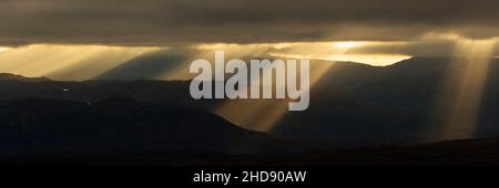 Crepuscular rays, Sutherland mountains, Scotland Stock Photo