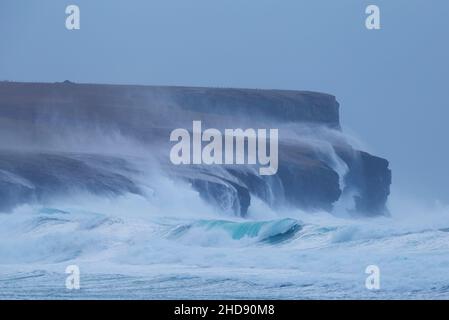 Waves crashing over 300ft cliffs at Marwick Head, Orkney Isles Stock Photo