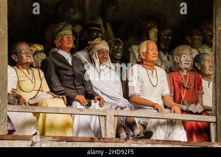 Effigies of dead people (Tau Tau) buried at the famous Londa burial caves, near Rantepao city. Londa, Rantepao, Toraja, South Sulawesi, Indonesia Stock Photo