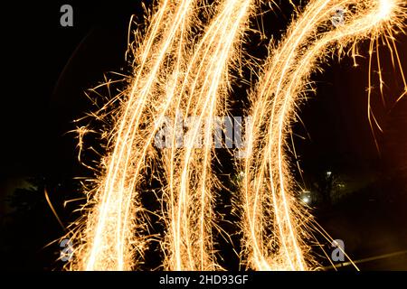 Scenic view of golden light streaks on a dark background Stock Photo