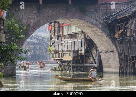 FENGHUANG, CHINA - AUGUST 14, 2018: River boats in the ancient city Fenghuang in Hunan province, China Stock Photo