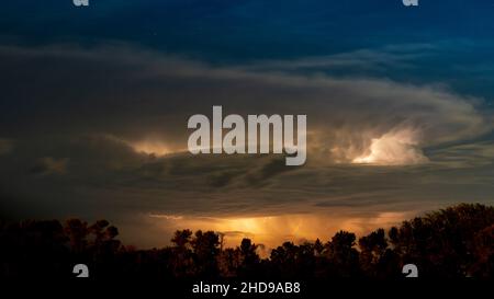 A thunder storm with lightning in the clouds south of Winkler, Maniotba, Canada. Stock Photo