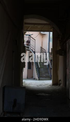 Old buildings of downtown of Baku. Old stair in narrow streets of the old city of Baku. Stock Photo