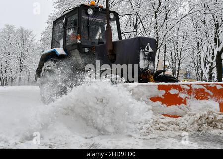 Kramatorsk, Ukraine. 26th Dec, 2021. A car is driving down the road ...