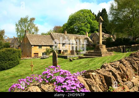 views of Snowshill  village War memorial  in church yard Stock Photo