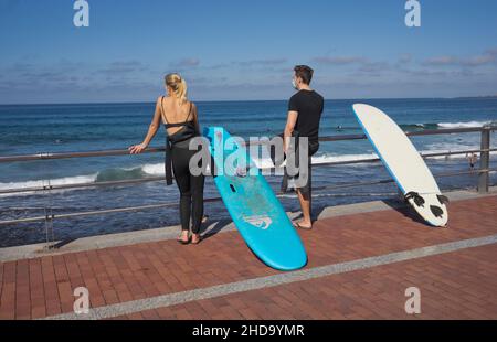 People swimming, playing sports, surfing, eating and drinking at Las Canteras beach in Las Palmas, Gran Canaria, Canary Islands,Spain Stock Photo