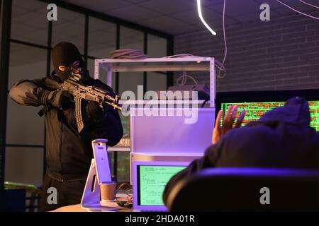 Assault team arresting hacker in dark room Stock Photo - Alamy