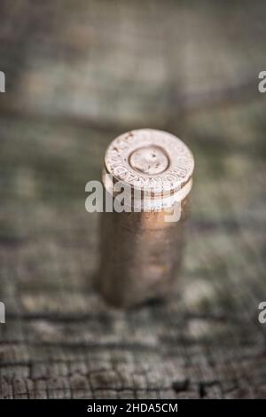 bullet casing abandoned on the ground Stock Photo