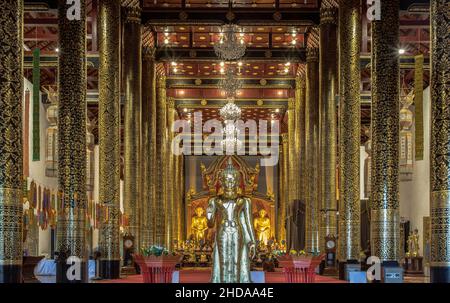 Chiangmai, Thailand - Sep 07, 2019 : The golden buddha image inside the Buddhist church at the famous Wat Chedi Luang Varavihara It is a temple locate Stock Photo