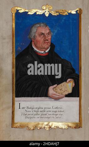 Portrait of Luther with a Latin poem. 1562 Martin Luther (1483 – 1546) was a German professor of theology, priest, author, composer, former Augustinia Stock Photo