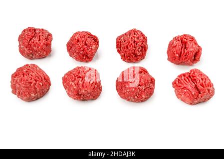 Raw meat balls isolated on white background. Stock Photo