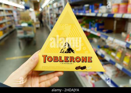 Tyumen, Russia-December 02, 2021: Swiss milk chocolate toblerone. Made by Kraft Foods. Stock Photo