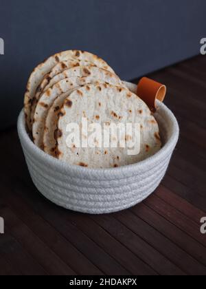 Round crispbreads in textile basket Stock Photo