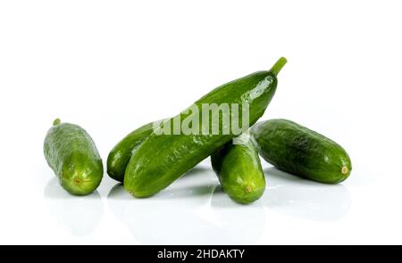 Freshly harvested mini cucumber on isolated white background Stock Photo