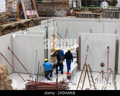 Bauarbeiter bei der Arbeit Stock Photo