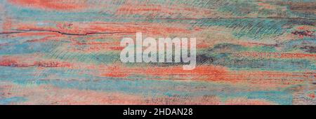 Textured wooden background - grungy weathered wooden surface covered with old blue and red peeling paint BANNER, long format Stock Photo