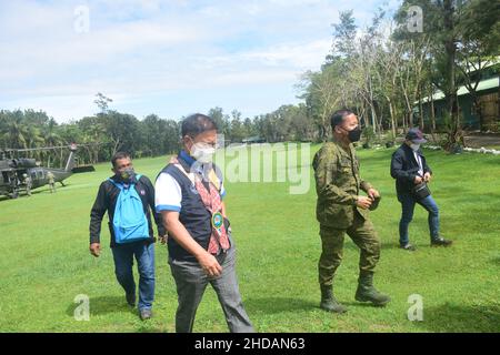 Bais, Philippines. 05th Jan, 2022. DPWH acting Secretary Roger G. Mercad, Lt. Gen. Robert C. Dauz PA Commander, Visayas Command, AFP with governor Governador Roel Ragay Degamo checked the devastation brought about by Typhoon Odette in Bais City. They conducted site visit and inspected the on-going joint clearing operations by LGU-DPWH. (currently undertaking massive clearing activities along Negros, Cebu and Bohol) (Photo by Joseph C. Ceriales/Pacific Press) Credit: Pacific Press Media Production Corp./Alamy Live News Stock Photo