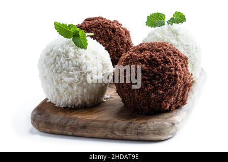 Homemade  chocolate and coconut flakes balls isolated on white Stock Photo